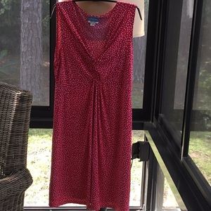 V-neck dress with polka-dots. Pinkish red color.